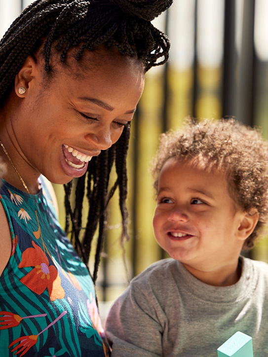 Mother and son smiling